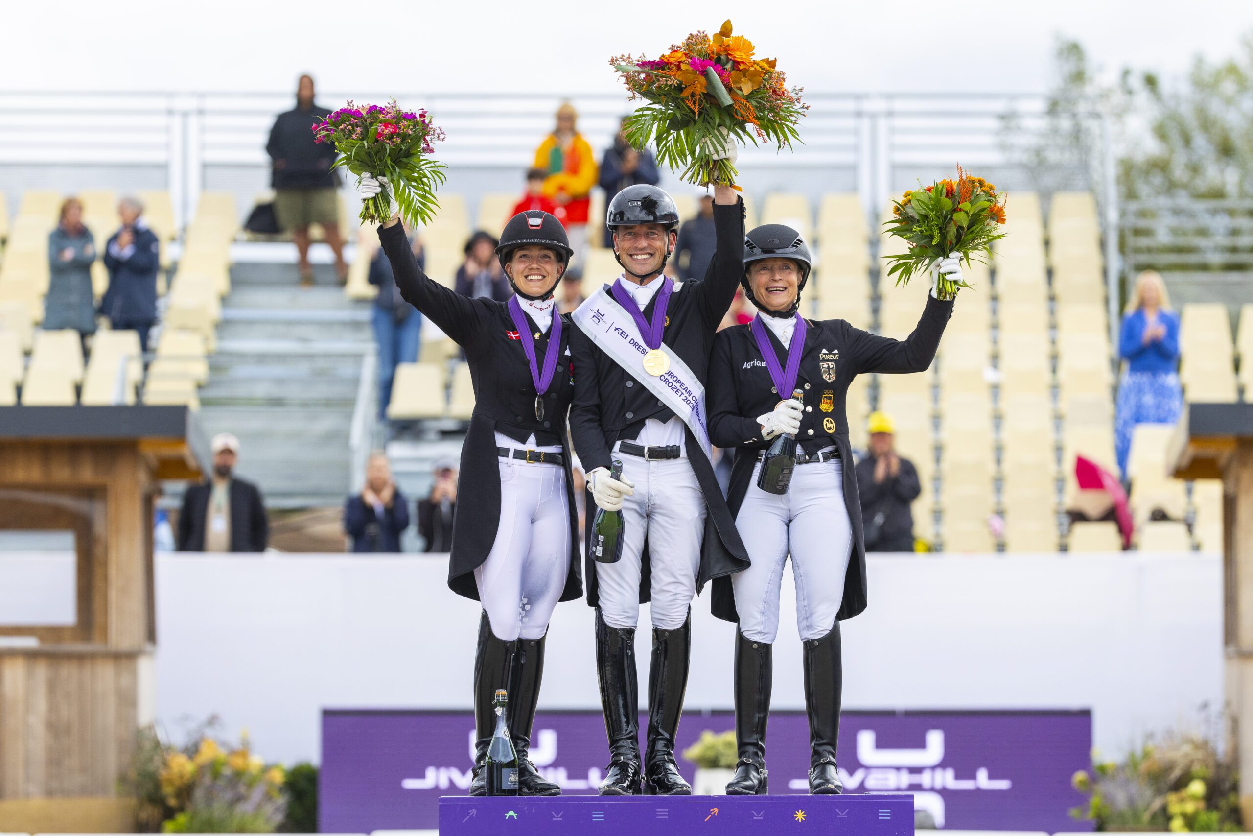 Podium Grand Prix Special 1. Justin Verboomen (BEL) 2. Cathrine Laudrup Dufour (DEN) 3. Isabell Werth (GER) in the FEI Dressage European Championship - Crozet (FRA)
